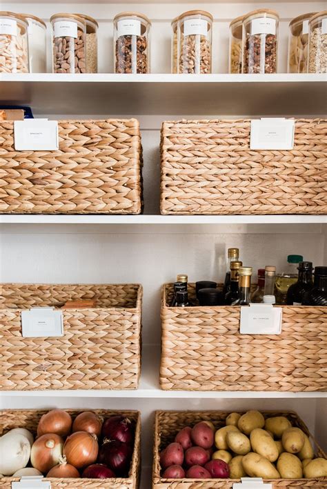 Baskets Filled With Food Sitting On Top Of Shelves