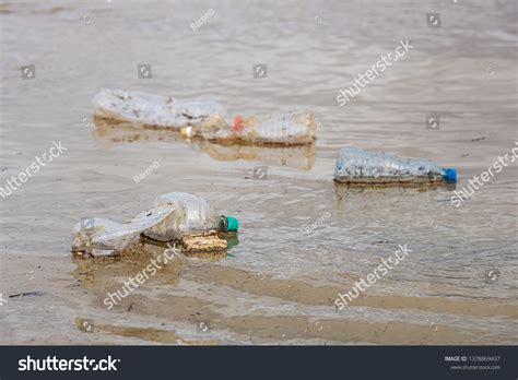 Plastic Garbage River Pollution Environment Concept ภาพสตอก 1378869437