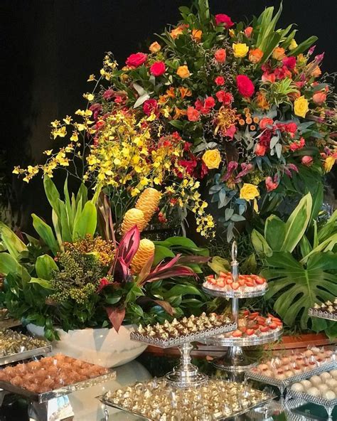 An Assortment Of Desserts And Pastries On Display In A Buffet Style