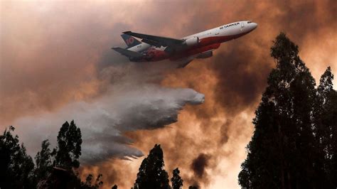 At least 26 dead and 2,000 injured as wildfires rage out of control ...