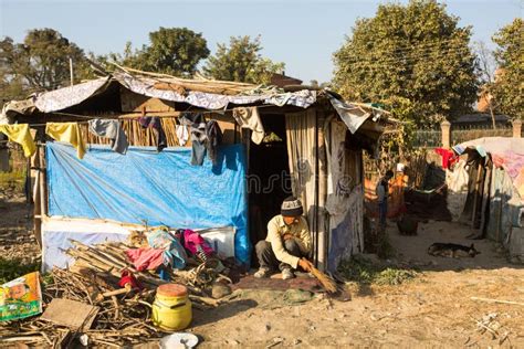 Unidentified Poor People Near Their Houses At Slums In Tripureshwor