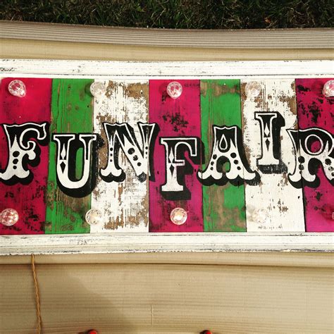 This Funfair Sign With Fabulous Green Pink And White Stripes Screams