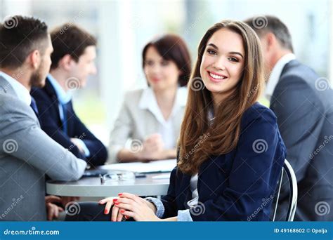 Business Woman With Her Staff People Group In Background Stock Photo