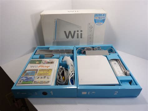 Nintendo Wii White RVL 001 Console Sports Bundle W Box TESTED