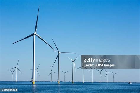 Wind turbines on the Fryslan Wind Farm at the IJsselmeer in... News ...