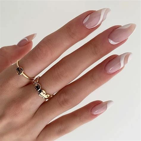 KXAMELIE Medium Length Almond Press On Nails With Designs Nude White