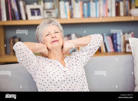 Senior Woman Suffering From Neck Pain Stock Photo Alamy