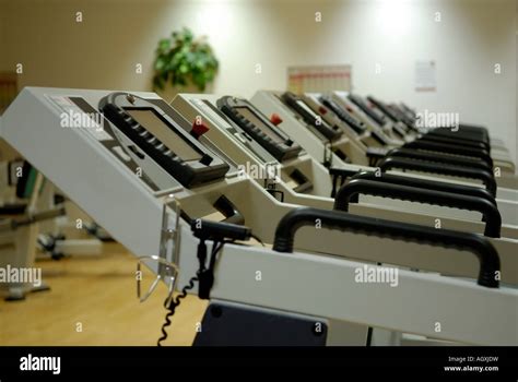 A picture of a Running machine in a gym Stock Photo - Alamy