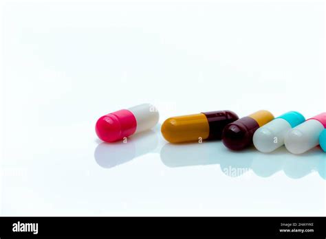 Multi Color Antibiotic Capsule Pills On White Background Antibiotic