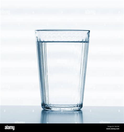 typical full water glass Stock Photo - Alamy