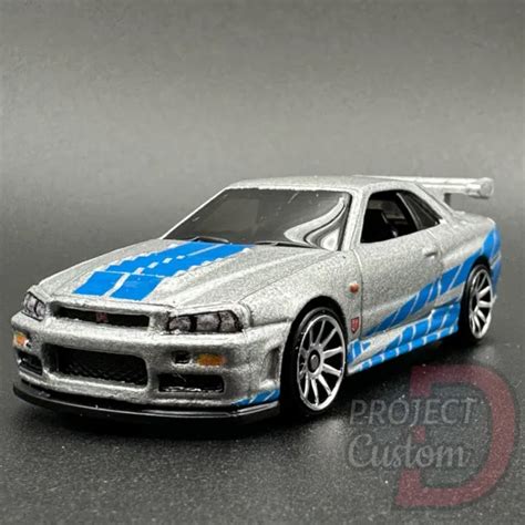 HOT WHEELS NISSAN Skyline R34 GTR Fast And Furious DMC55 957L 1 64 EUR