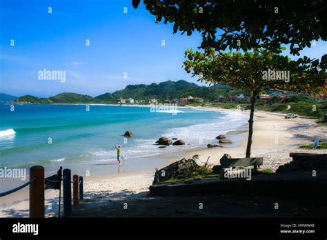 Sunny Day At The Beach Very Hot And People Having Fun Stock Photo Alamy