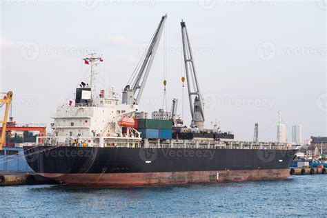 Cargo Ship in port 11560191 Stock Photo at Vecteezy