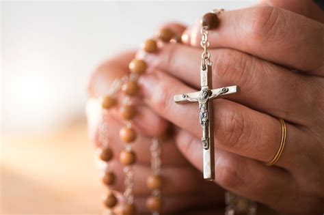 Praying Hands With Rosary