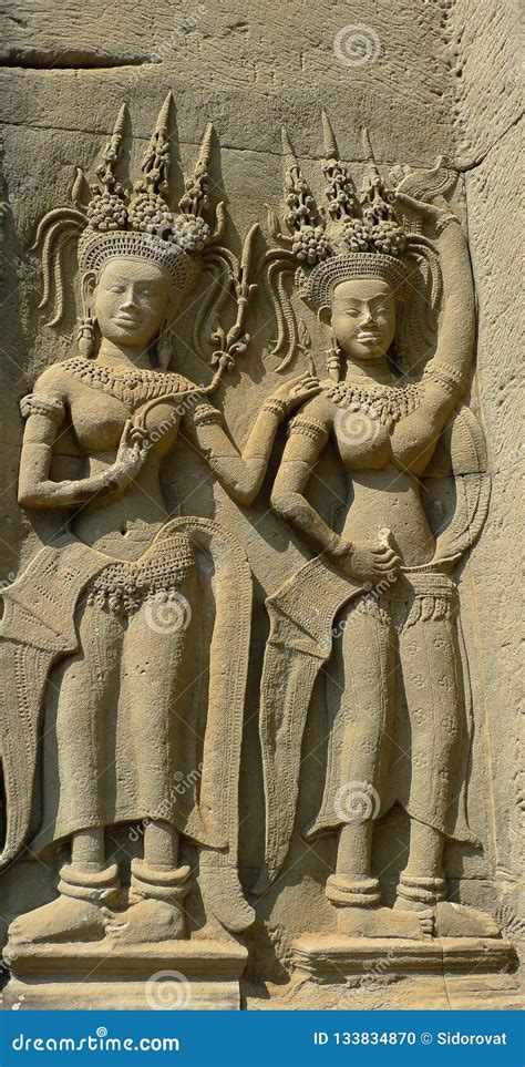 Bas-relief of Two Dancing Apsaras in Angkor Wat Temple Stock Photo ...