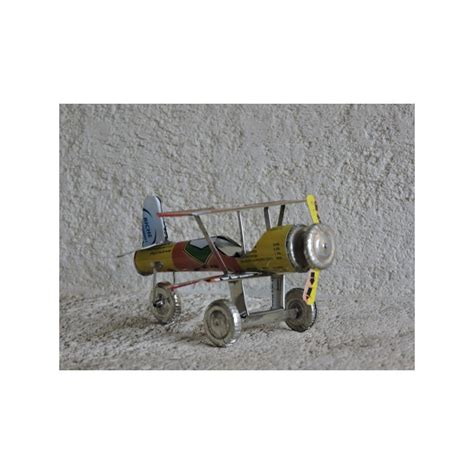 Biplane Made Of Recycled Metal Madame Framboise