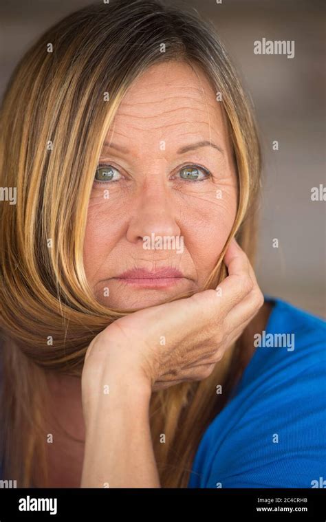 Portrait Attractive Mature Woman In Relaxed Confident Pose Serious