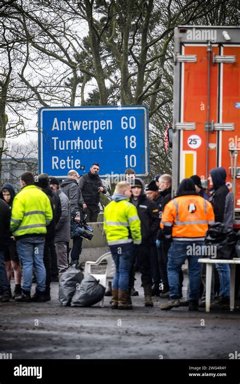 ARENDONK Belgian Farmers Clean The Road Surface While Blocking The