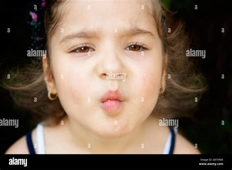 girl making fish face stock photo alamy