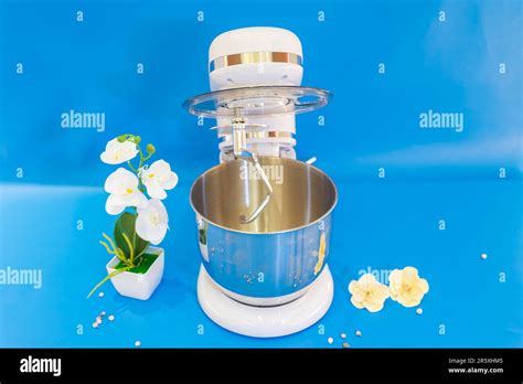 The Blue Accented White Cake Mixer Is A Perfect Companion For All Your