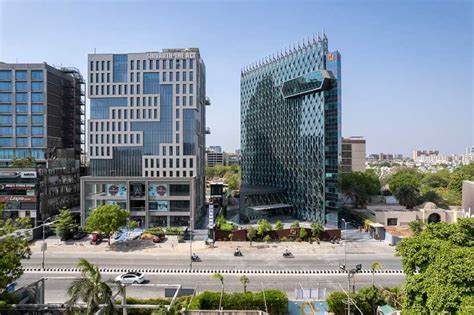 Quilted Patterns Wrap The Façade Of Monte Carlos New Corporate