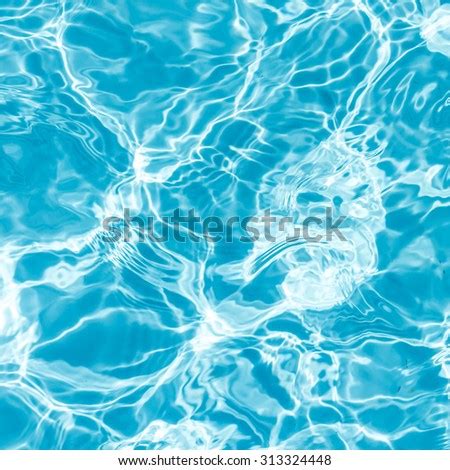 Background Of Rippled Pattern Of Clean Water In A Blue Stock Image