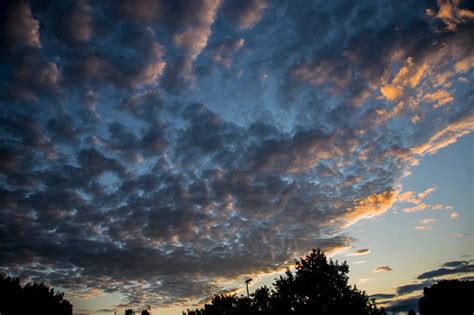 Stratocumulus Clouds At Sunset Stock Photo - Download Image Now - Cloud ...