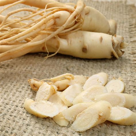 Download A Bunch Of Ginseng Root And A Piece Of Ginseng | Wallpapers.com