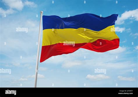 flag of Austroasiatic peoples Khmer Krom at cloudy sky background ...