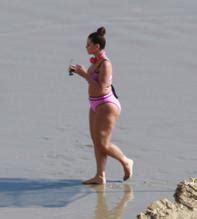 Ashley Graham Wearing A Pink Bikini At The Beach In Los Angeles California AZNude