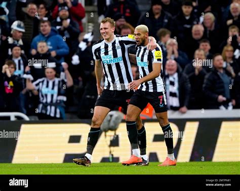 Newcastle Uniteds Dan Burn Left Celebrates With Team Mate Joelinton After Scoring Their Side