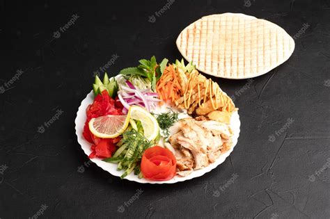 Premium Photo Shawarma On A Plate A Large Portion Of Shawarma On A