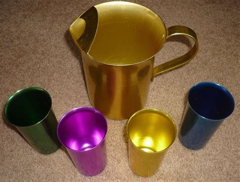 4 Vintage Sunburst Colored Aluminum Drinking Glasses Cups And Pitcher W Ice Guard Colored