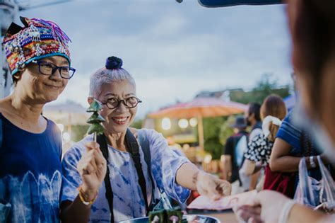 Eccentric Grandmother While Traveling Local Street Night Market In