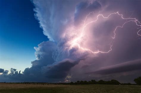 Premium Photo | Thunderstorm cumulonimbus cloud illuminated by lightning