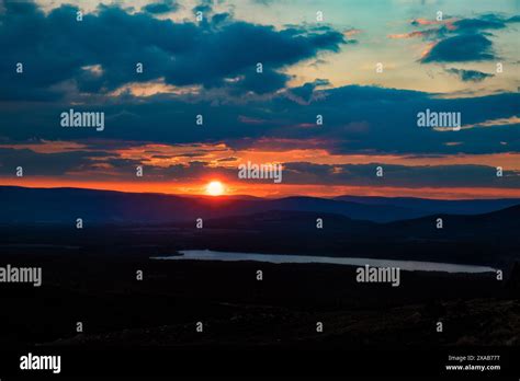 Loch Morlich sunset Stock Photo - Alamy