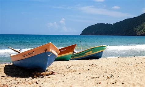 Boats On Caribbean Beach Photograph By Erik Lunoe Fine Art America