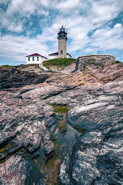 Beavertail Lighthouse Over Unique Rock Formation Photograph By Alex