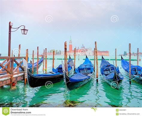 Panoramic View Of Traditional Gondolas On Canal Grande With San Giorgio