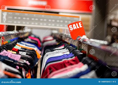 Retail Clothes Store Clearance Garment Shop With Various Bright Youth