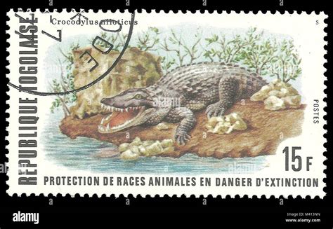 Togo - stamp printed in1977, Fauna, Series Endangered animals, Nile Crocodile Stock Photo - Alamy