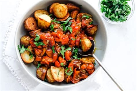 Roasted Potatoes With Tomatoes And Herbs Happy Veggie Kitchen