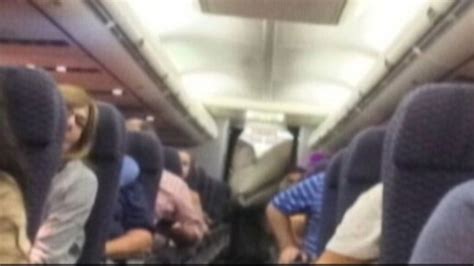 United Airlines Flight Diverted After Emergency Slide Deploys Video