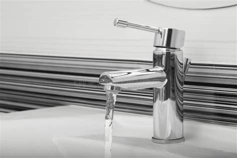 Stream Of Water Flowing From Tap In Bathroom Stock Image Image Of