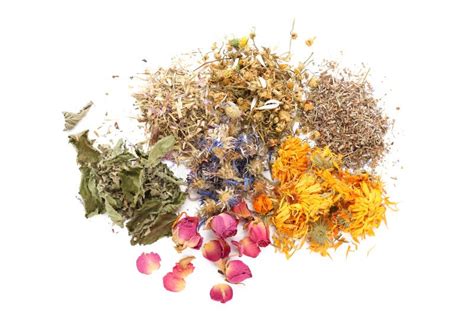 Heap Of Different Aromatic Dried Herbs And Flowers On White Background