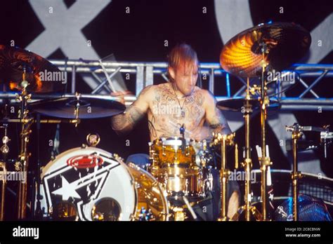 Travis Barker in Blink 182 performing at the Reading Festival 2003 ...