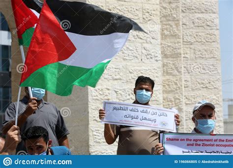 Palestinians Stage A Protest Against The Normalization Deal Between