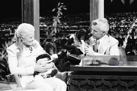 Enviromentalist Joan Embery With Host Johnny Carson Holding A Chimp