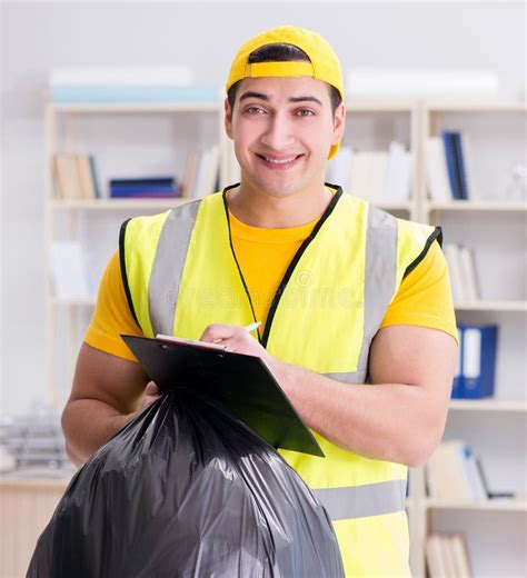 Man Cleaning The Office And Holding Garbage Bag Stock Photo Image Of