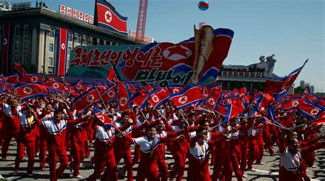 North Korea Holds Military Parade Without Icbms As Country Marks Anniversary